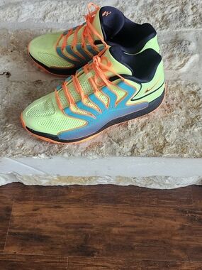 KD's Nike Yellow, Orange, and Neon Blue with Orange Embroidery